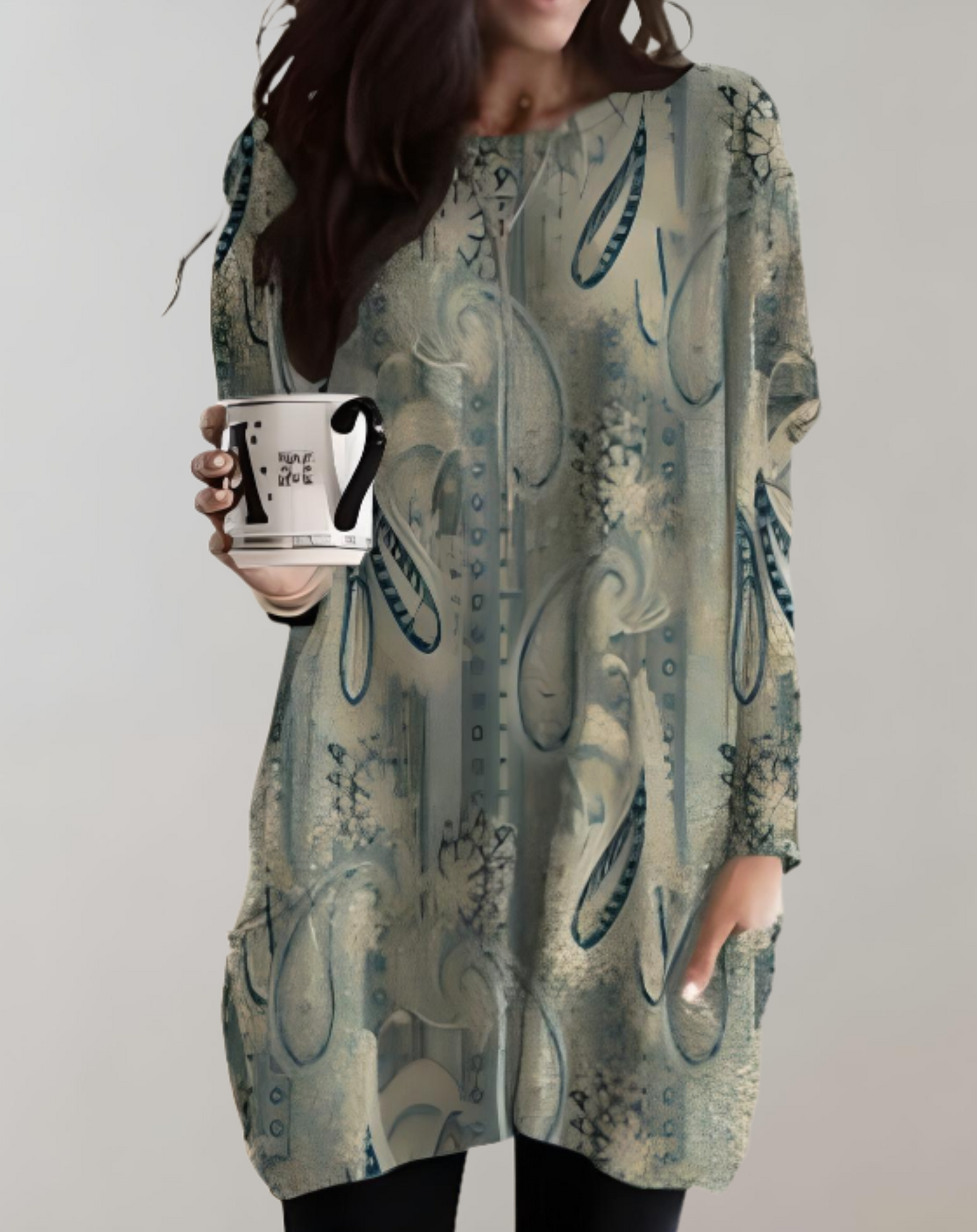 Klarissa | Lange zwierige oversized sweater met bloemdessin en zijzak