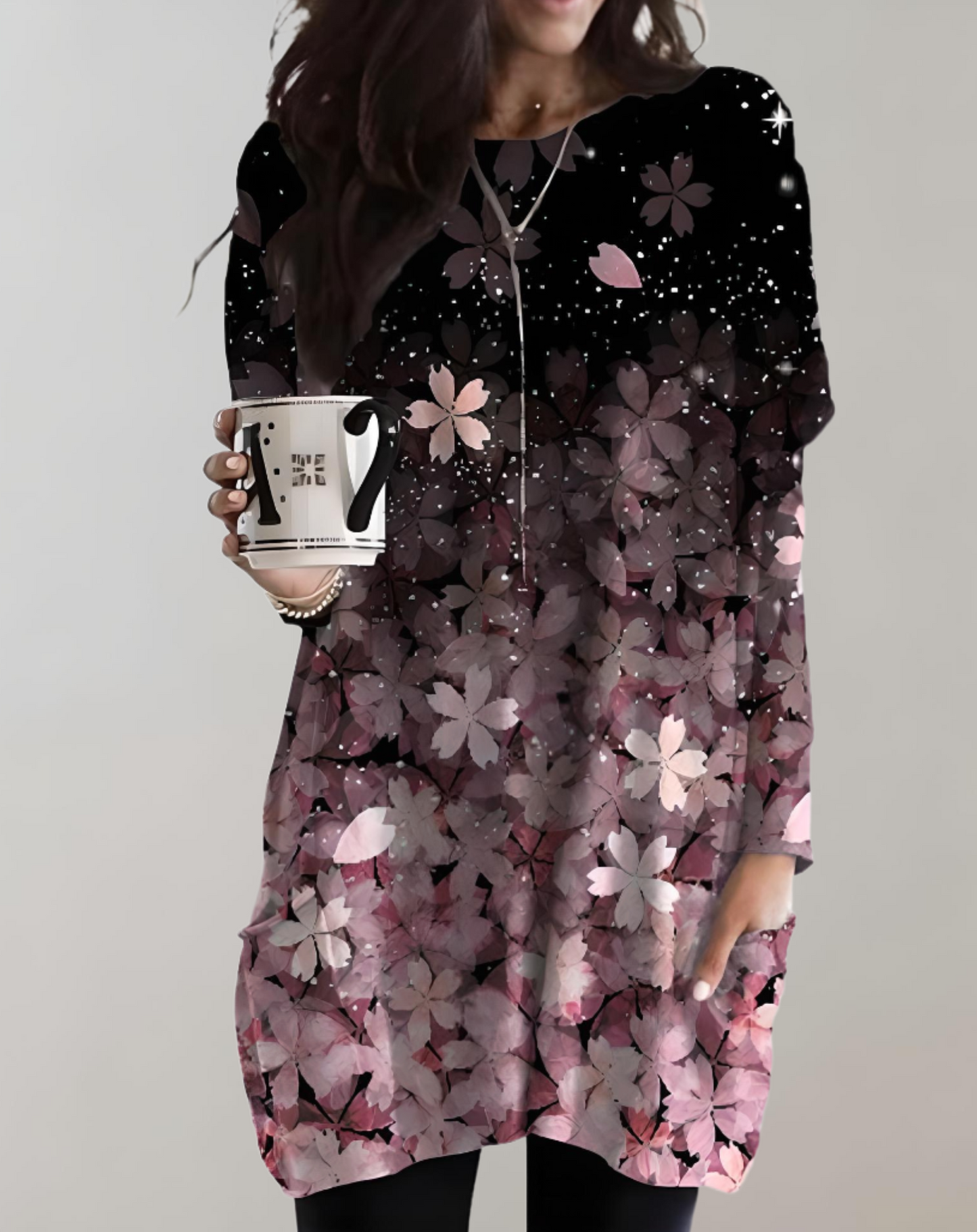 Klarissa | Lange zwierige oversized sweater met bloemdessin en zijzak