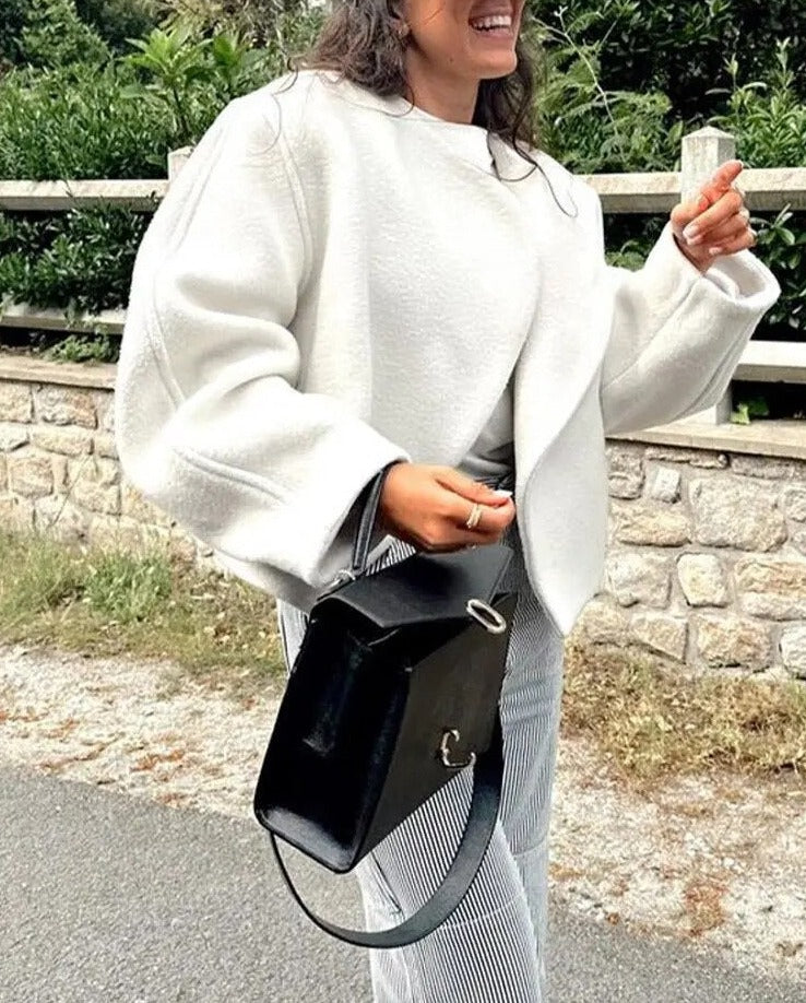 Nette korte witte jas