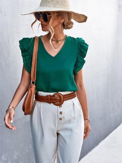 Groene top met kapmouwen