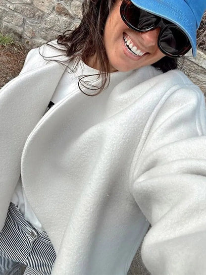 Nette korte witte jas