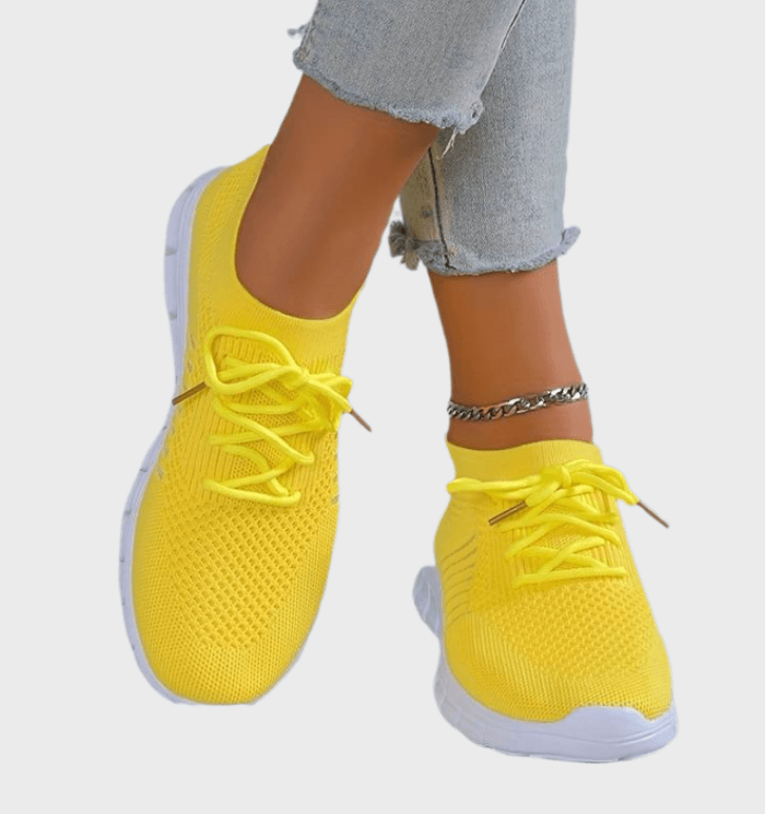 Maricar -  Laag uitgesneden hardloopsneakers van textiel met veters