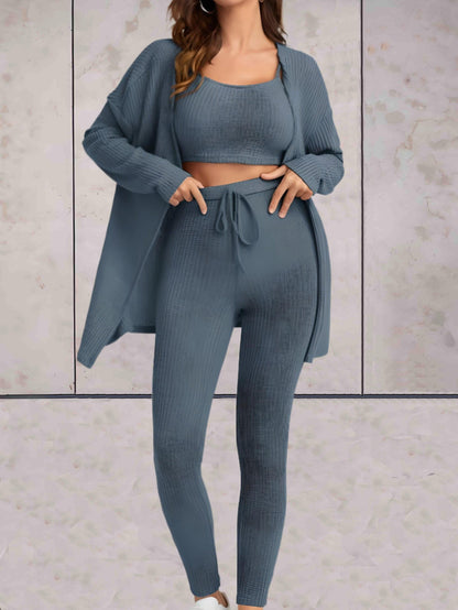 Sierra - comfortabele casual set van hoog getailleerde broek met knoop, crop top zonder mouwen en een oversized sweater