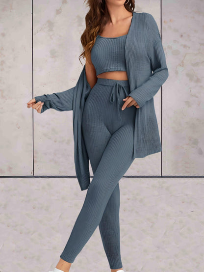 Sierra - comfortabele casual set van hoog getailleerde broek met knoop, crop top zonder mouwen en een oversized sweater