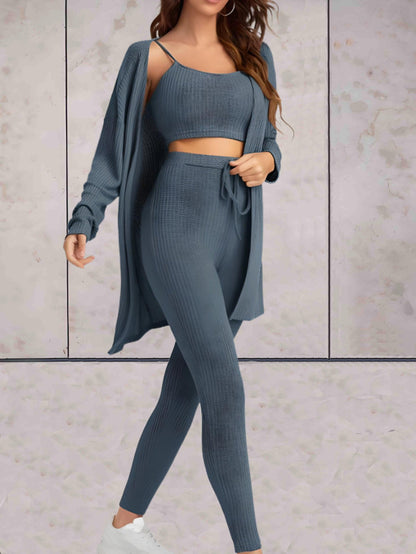 Sierra - comfortabele casual set van hoog getailleerde broek met knoop, crop top zonder mouwen en een oversized sweater