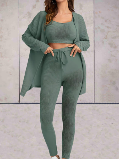 Sierra - comfortabele casual set van hoog getailleerde broek met knoop, crop top zonder mouwen en een oversized sweater