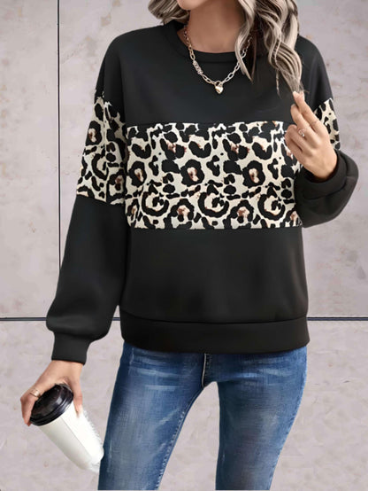 Chloe - Oversized trui met ronde hals en luipaardprint in het midden