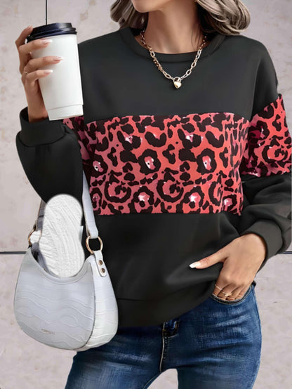 Chloe - Oversized trui met ronde hals en luipaardprint in het midden