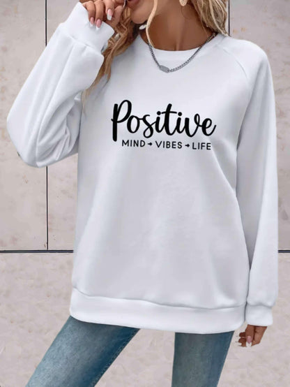 Adeline - Oversized trui met ronde hals en motiverende print